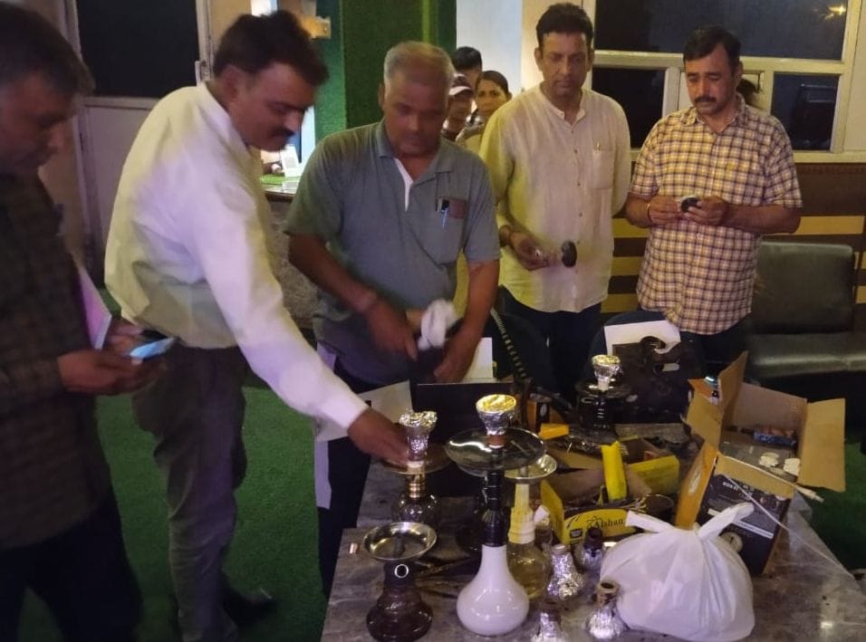 Raid the basement of the restaurant and caught hookah bar, nine hookahs recovered
