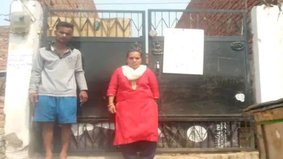 woman posters of House for sale put up at home after dispute with neighbor in Agra