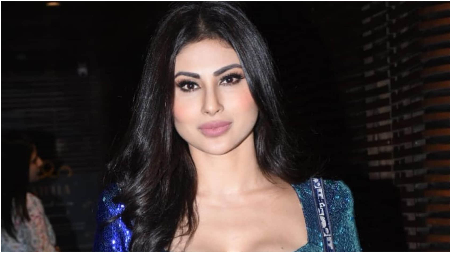 mouni roy sizzling look in tight fitting deep blue sequin short dress