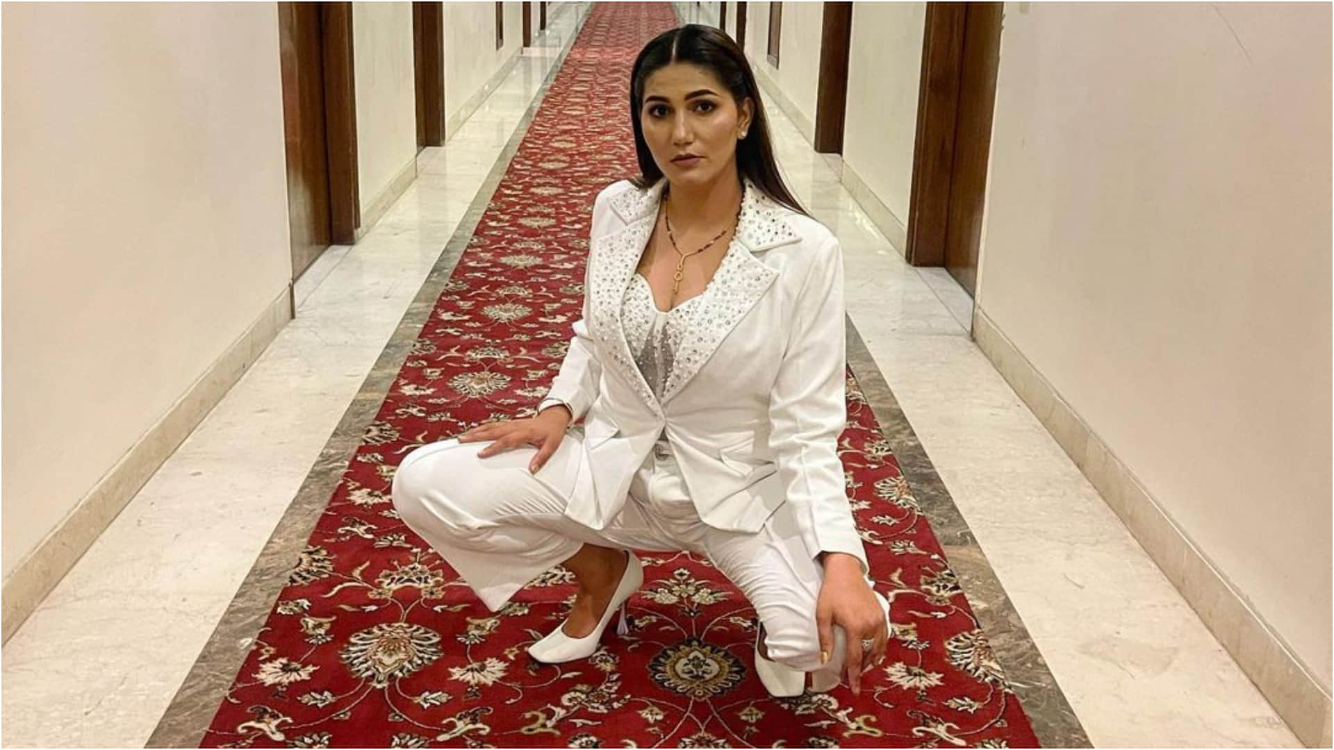 sapna choudhary sizzling look in bold white bustier outfit see pics