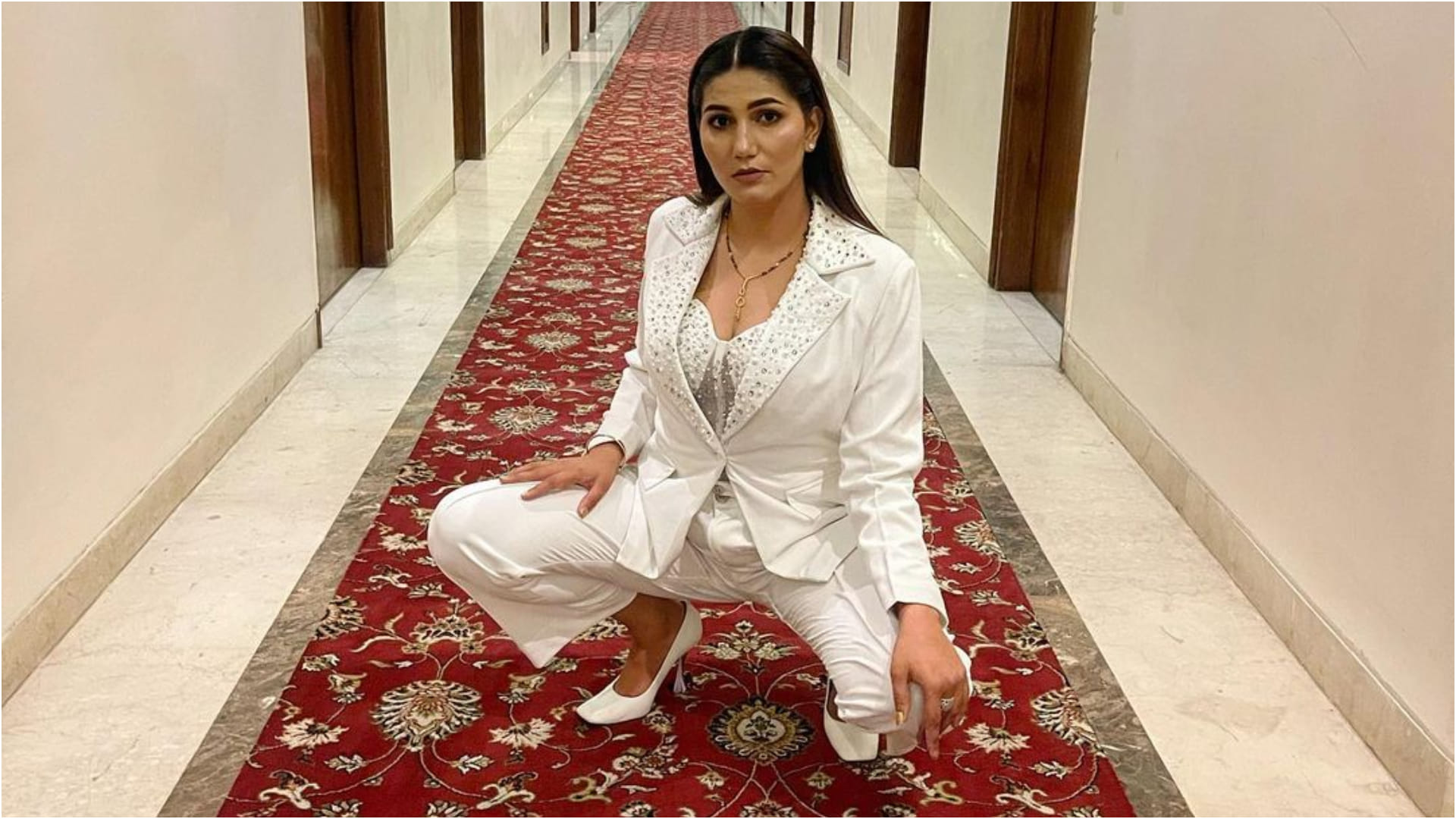 sapna choudhary sizzling look in bold white bustier outfit see pics