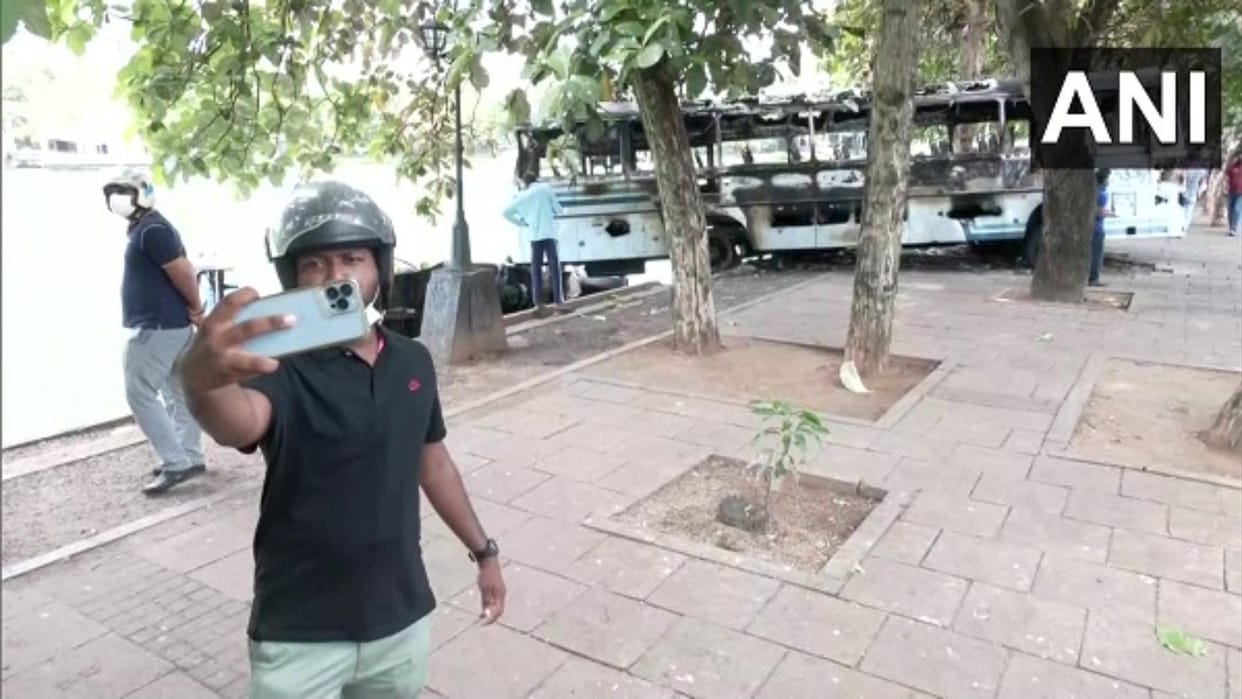 Burnt houses and submerged cars become selfie points outside PM residence of Sri Lanka amid economic political crisis