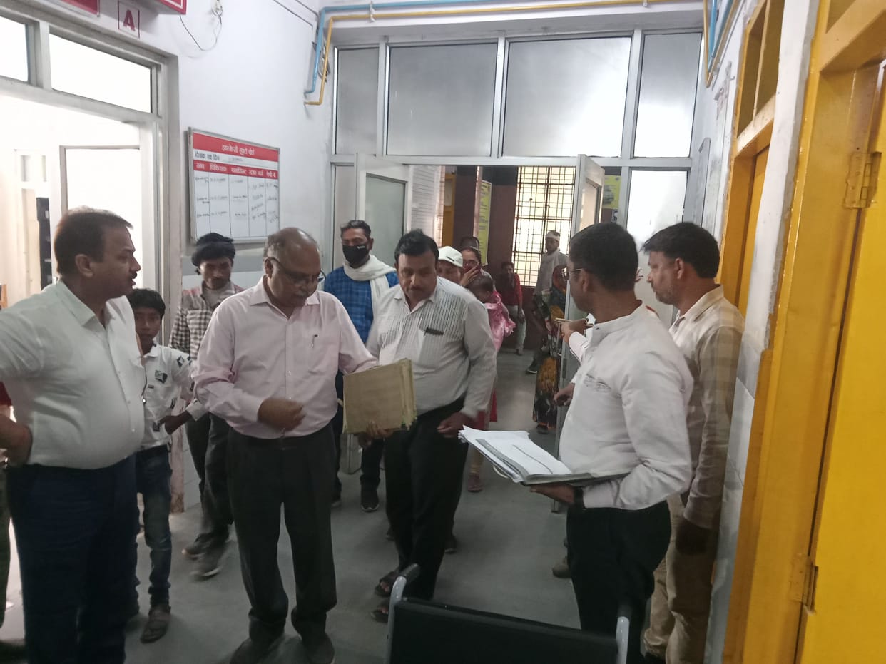 Withheld salary of 23 workers including nine doctors who were absent from duty