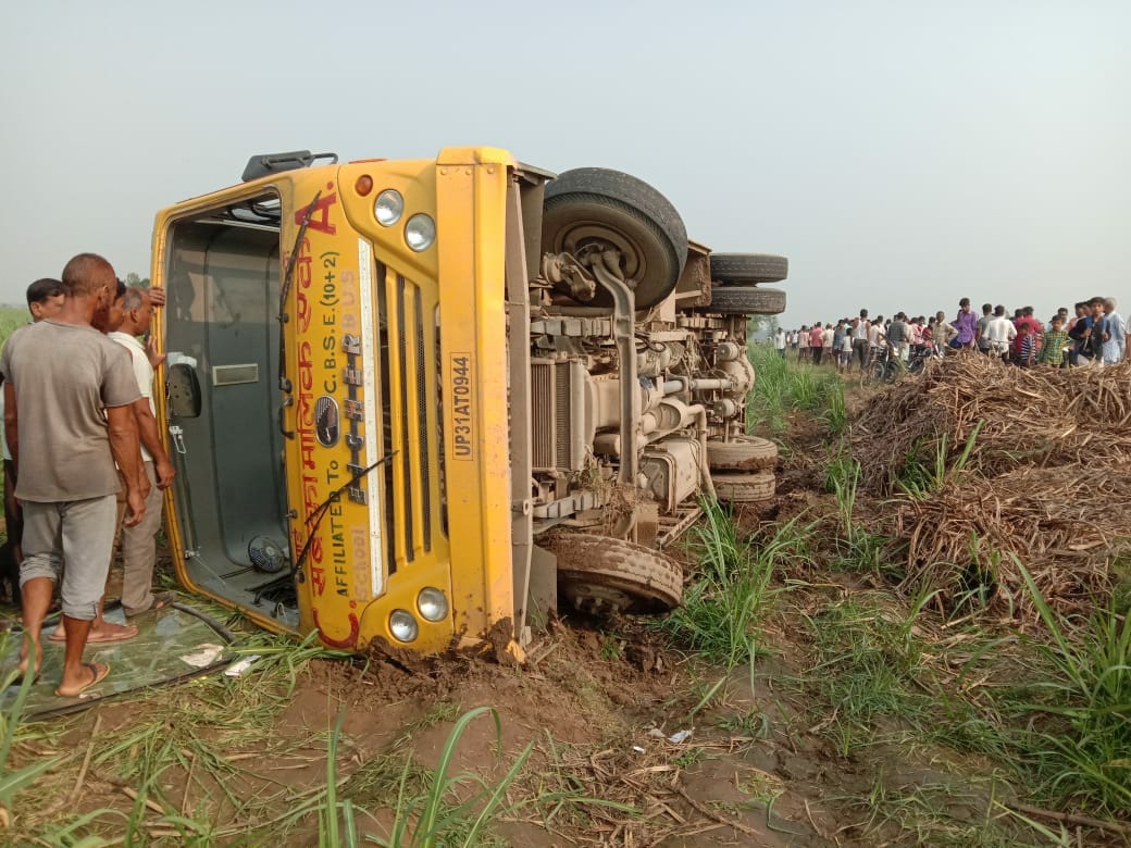The school bus overturned in the ditch due to the driver falling asleep
