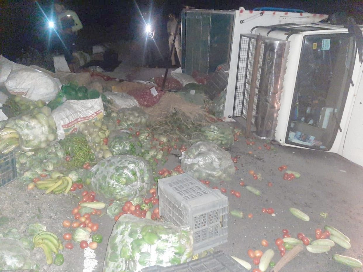 Cargo vehicle overturns, three people injured