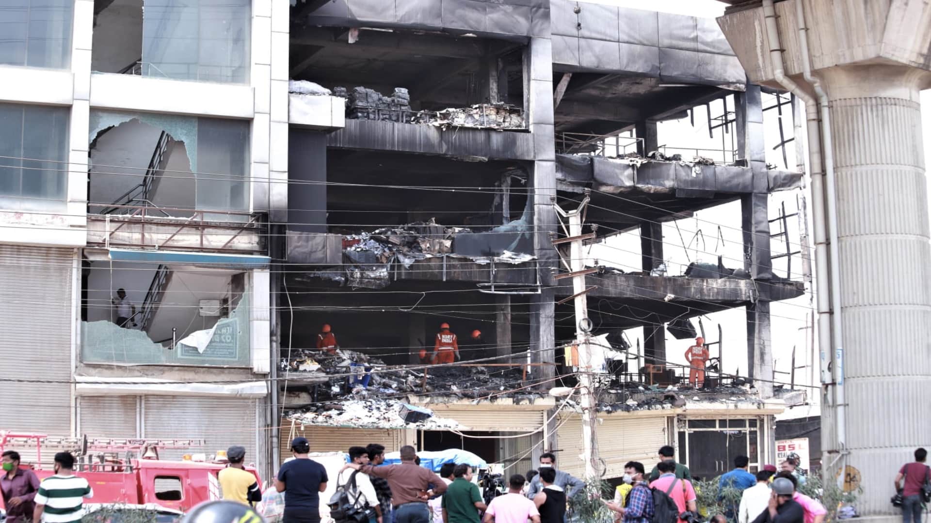 Mundka fire accident after four days life on track at incident place near by shops open