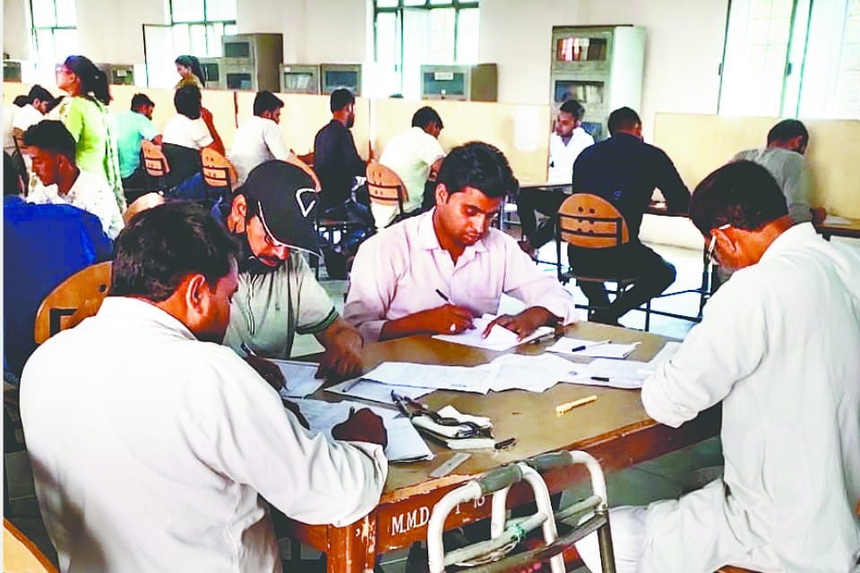 Rohilkhand University: During the LLB examination in Moradabad four students sitting on one table
