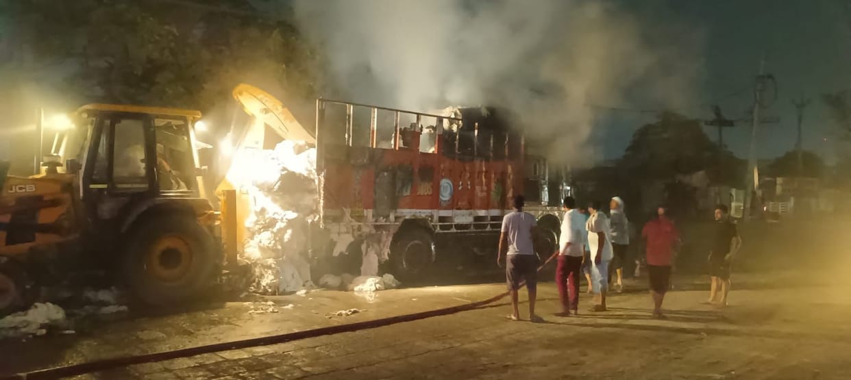 A cotton-filled truck caught fire due to short circuit, controlled in three hours