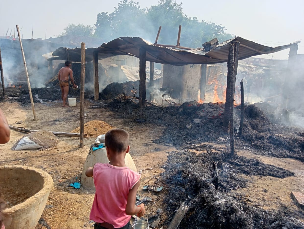 A dozen huts in the fire and the ashes kept in it