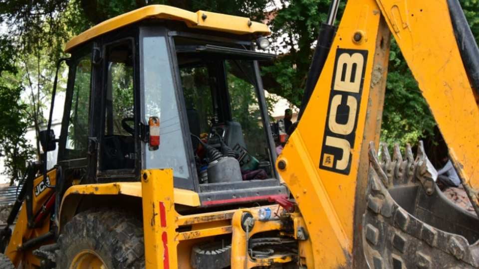 violence: Bulldozers reaching the violence-affected area created a stir, the houses being identified