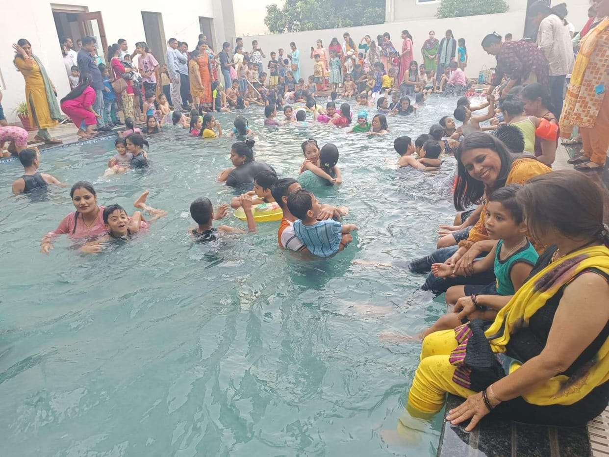 Kids having fun in the swimming pool