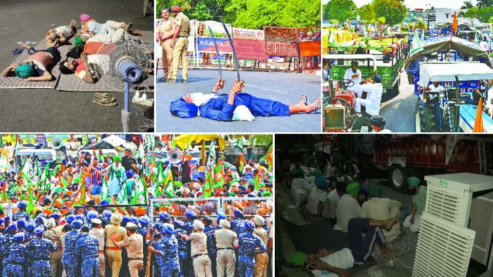 Farmers sit on a protest at Chandigarh Mohali border against Punjab government