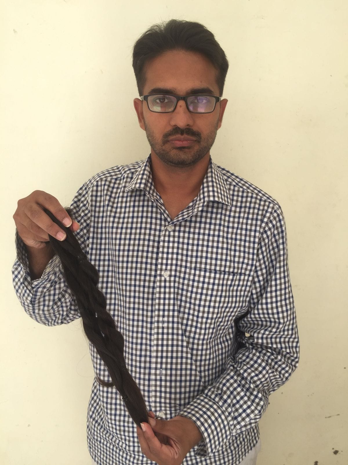Achal Jain donated his 21 inch long hair for cancer patient