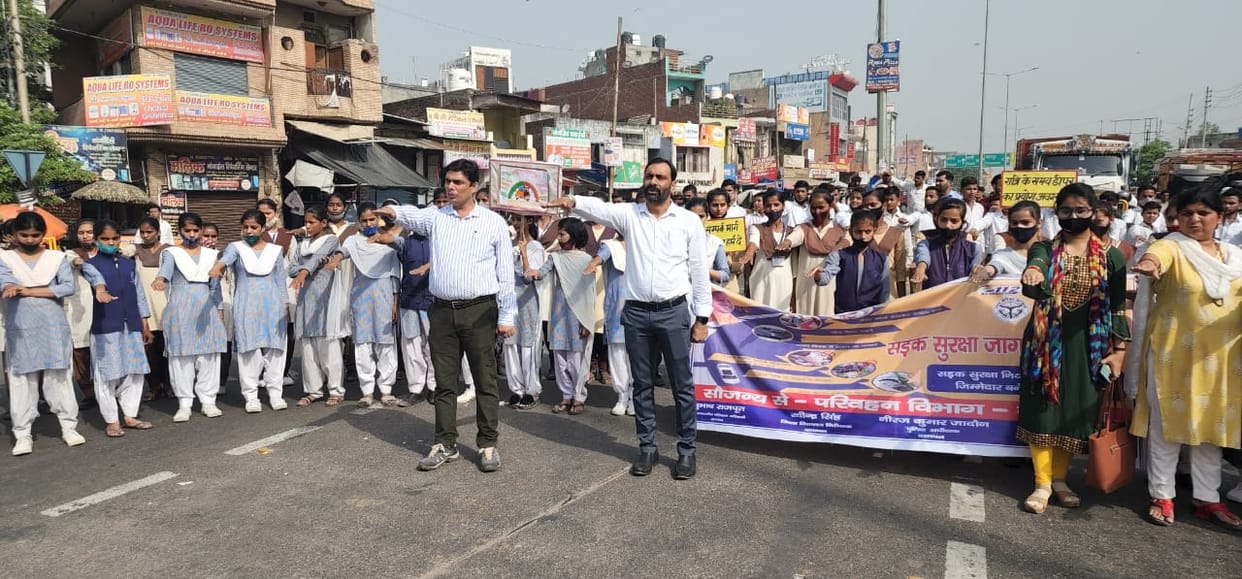 Pledge to follow traffic rules by forming human chain