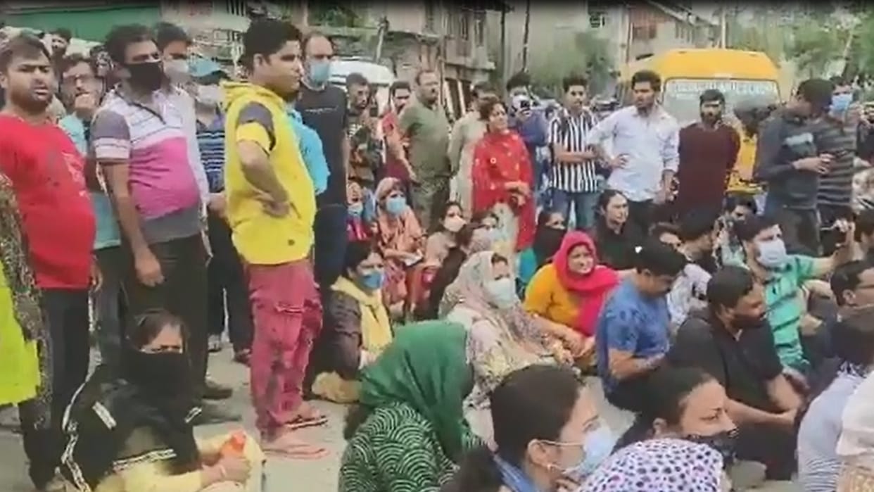 Budgam Kashmiri Pandits employees Protest against killing of Rahul Bhat demand for transfer at safe places