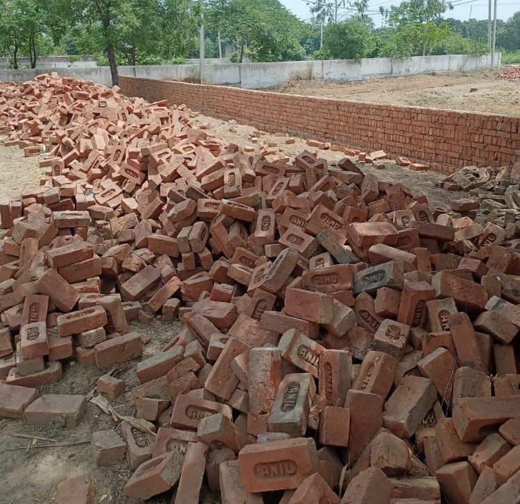 The wall built by occupying the temple land