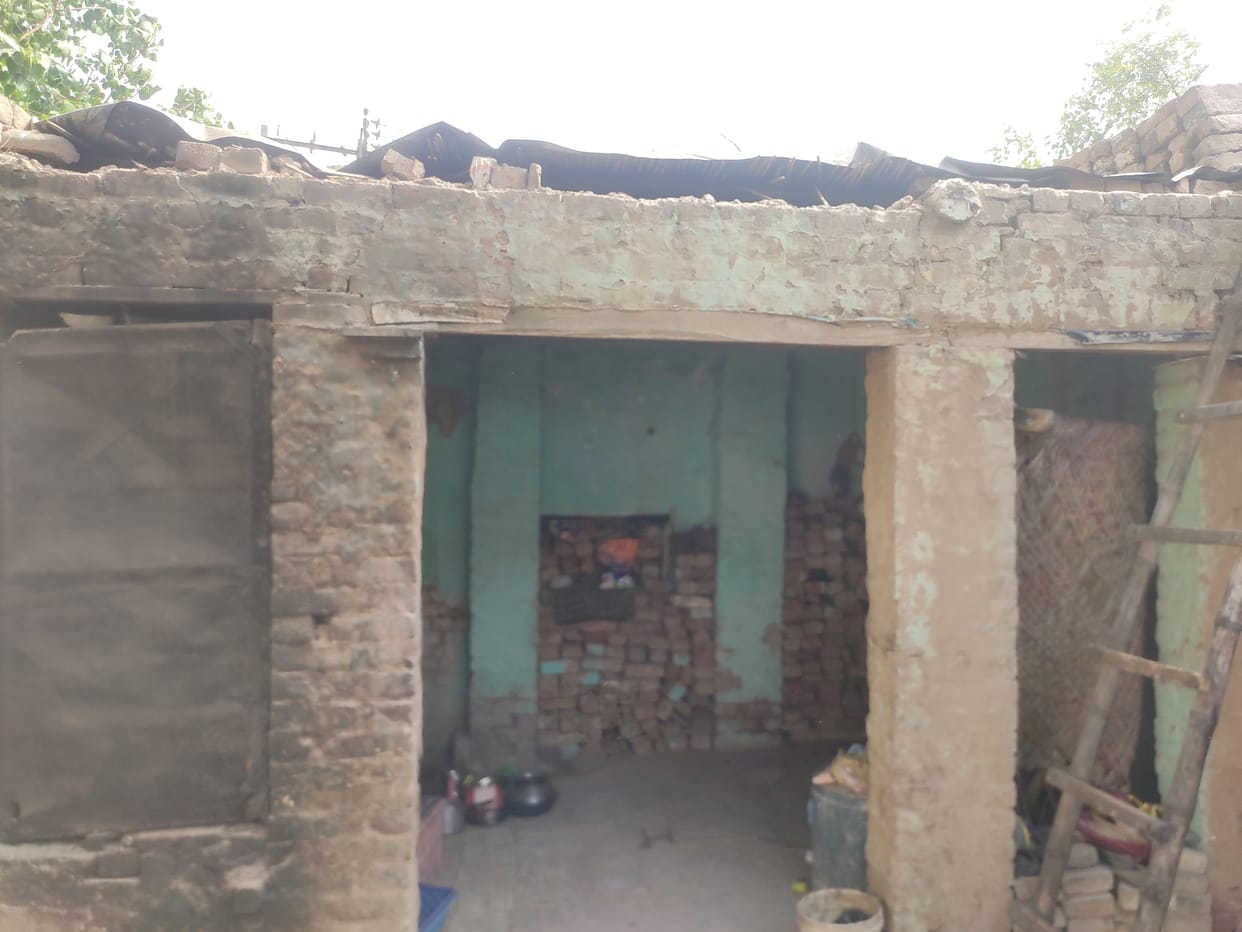 Raw roof, broken house and pension was the only support of old age, closed by showing dead