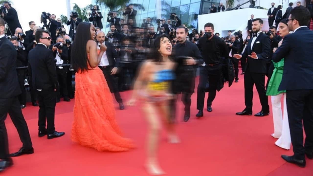 Cannes 2022: Woman strips off her clothes in Ukraine protest on Cannes red carpet