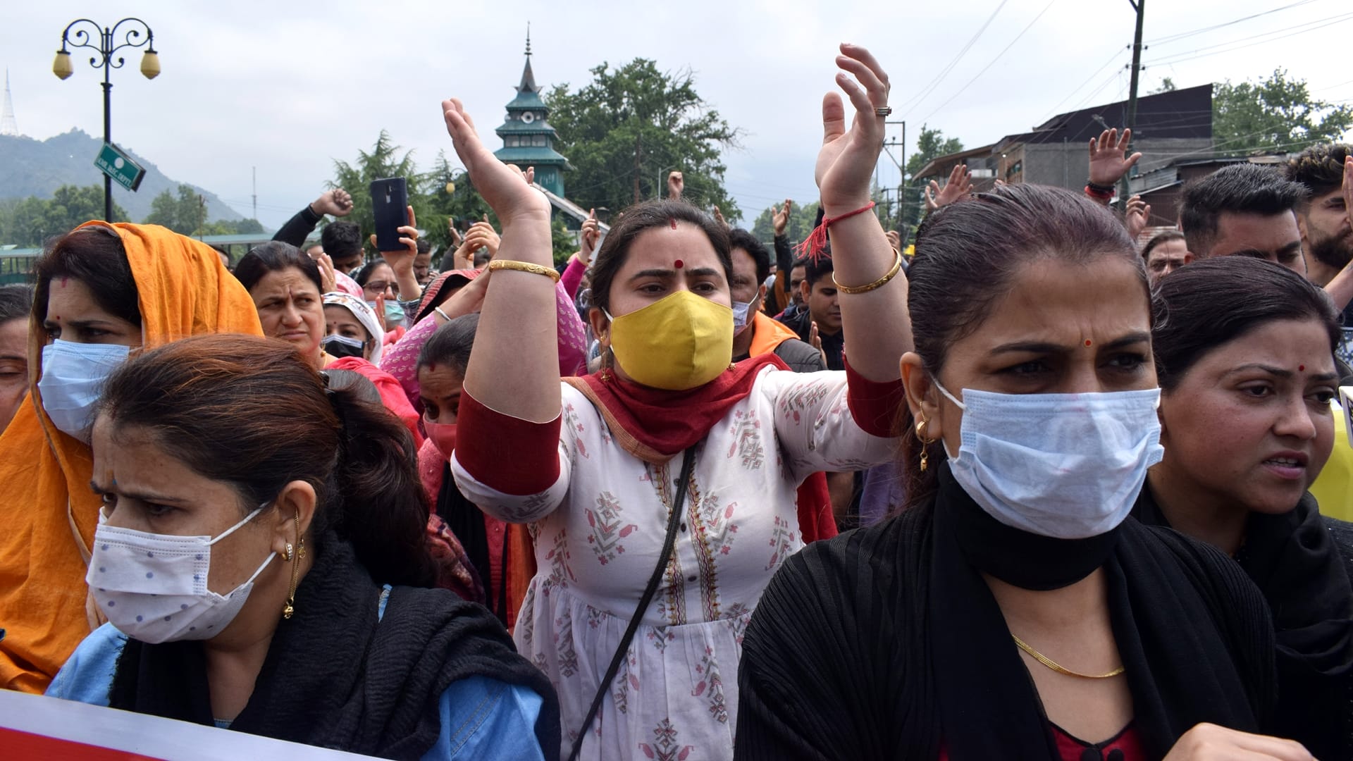 Rahul Bhatt 10th Day Kashmiri Pandits protest continues in kashmir organize rally pay tribute to Rahul by immersing flowers in Jhelum river