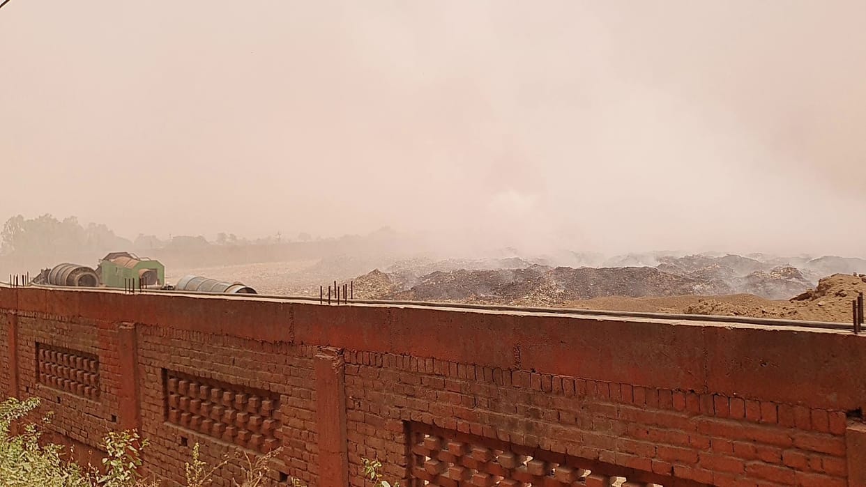Smoke in the dumping yard... people upset