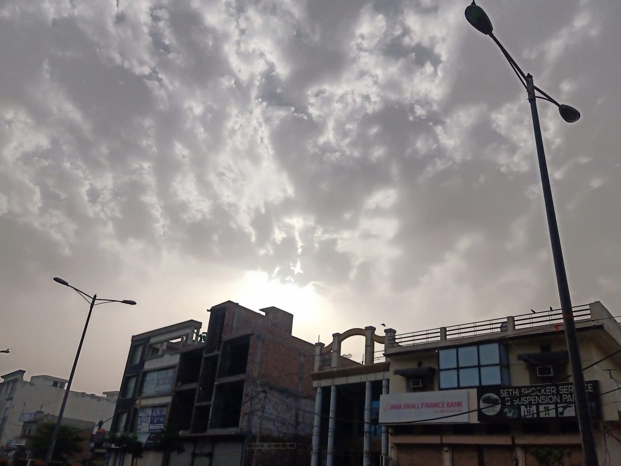 Drizzle and strong wind brought relief from the heat