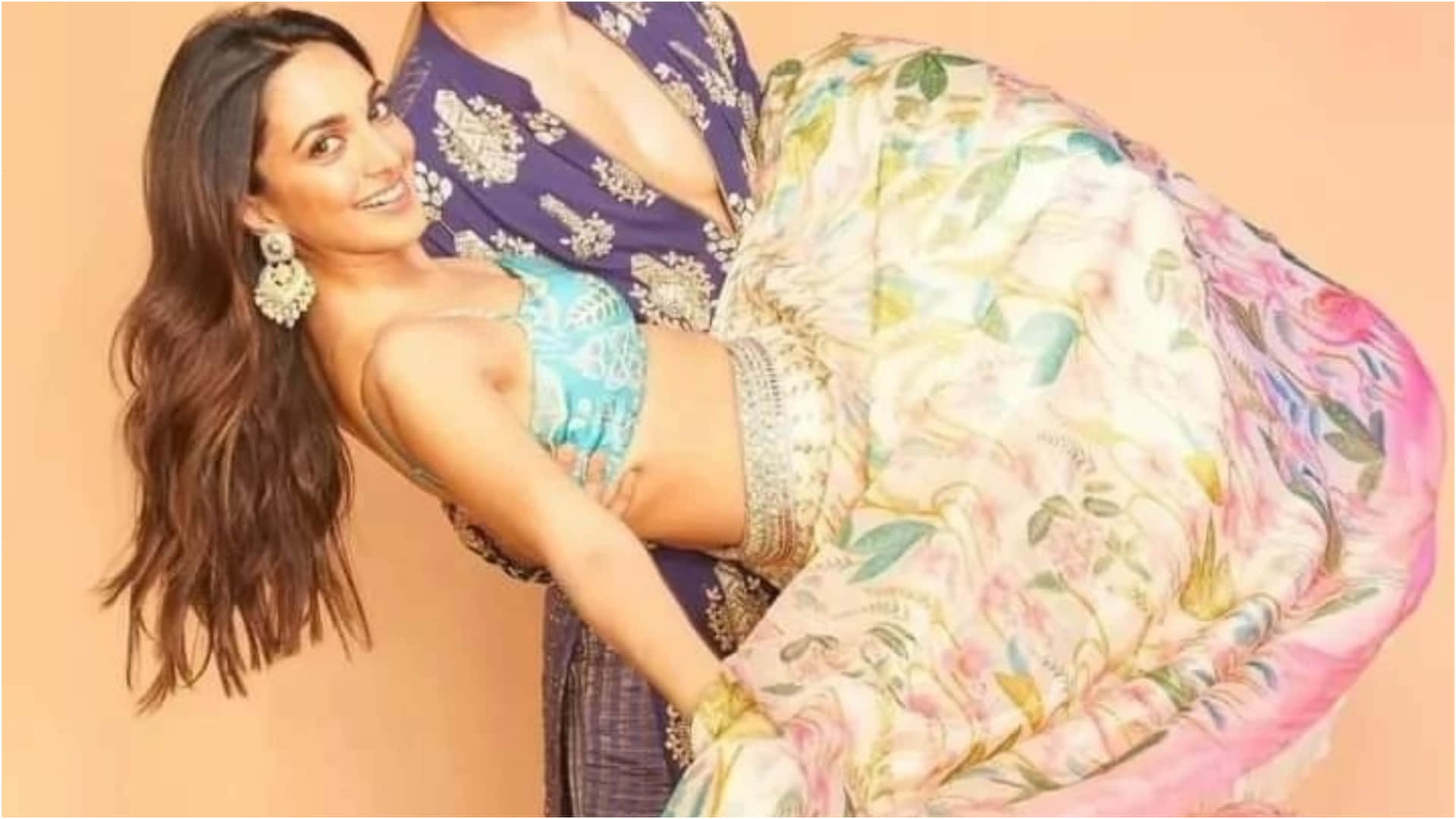 kiara advani look stunning in floral lehenga with tiny blouse for movie trailer launch