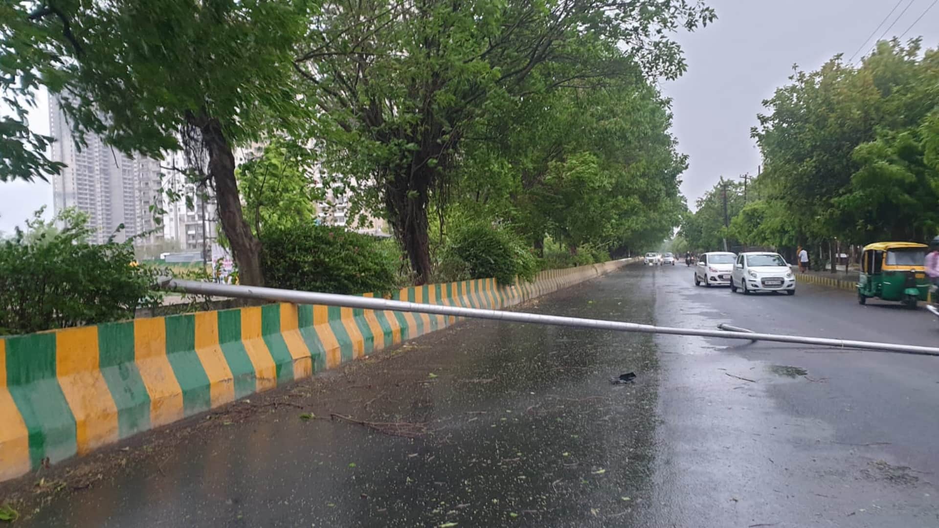 Delhi ncr receives heavy rainfall with strong thunder shower hailstorm in few areas waterlogging trees falling see photos