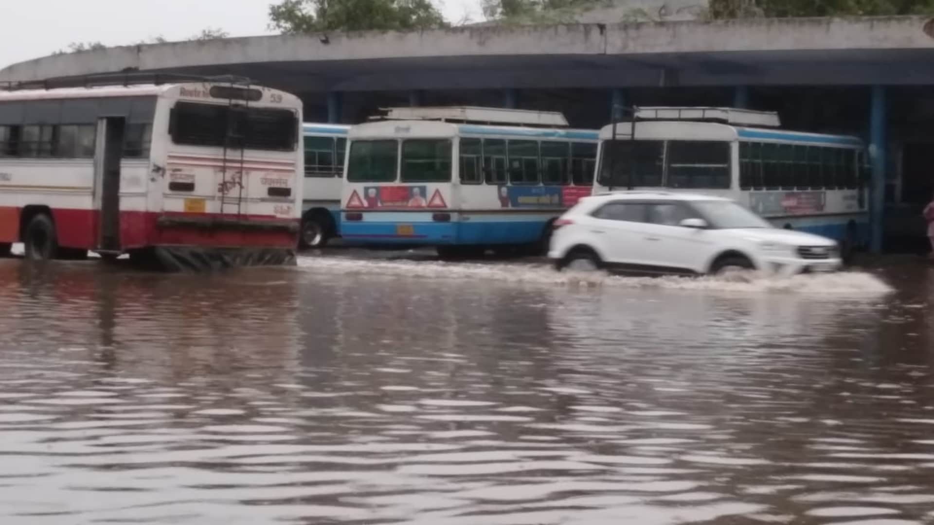 Delhi ncr receives heavy rainfall with strong thunder shower hailstorm in few areas waterlogging trees falling see photos