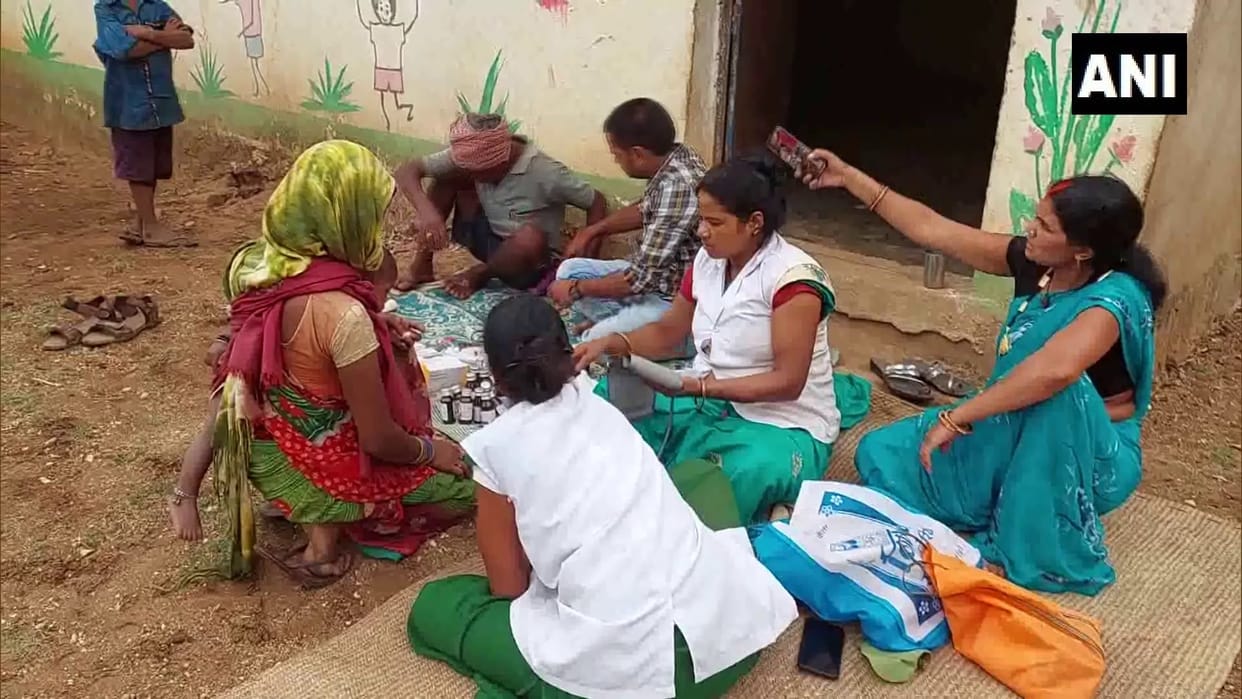 Chhattisgarh Health department ANM workers crossing dense forests to set up healthcare camps in  villages