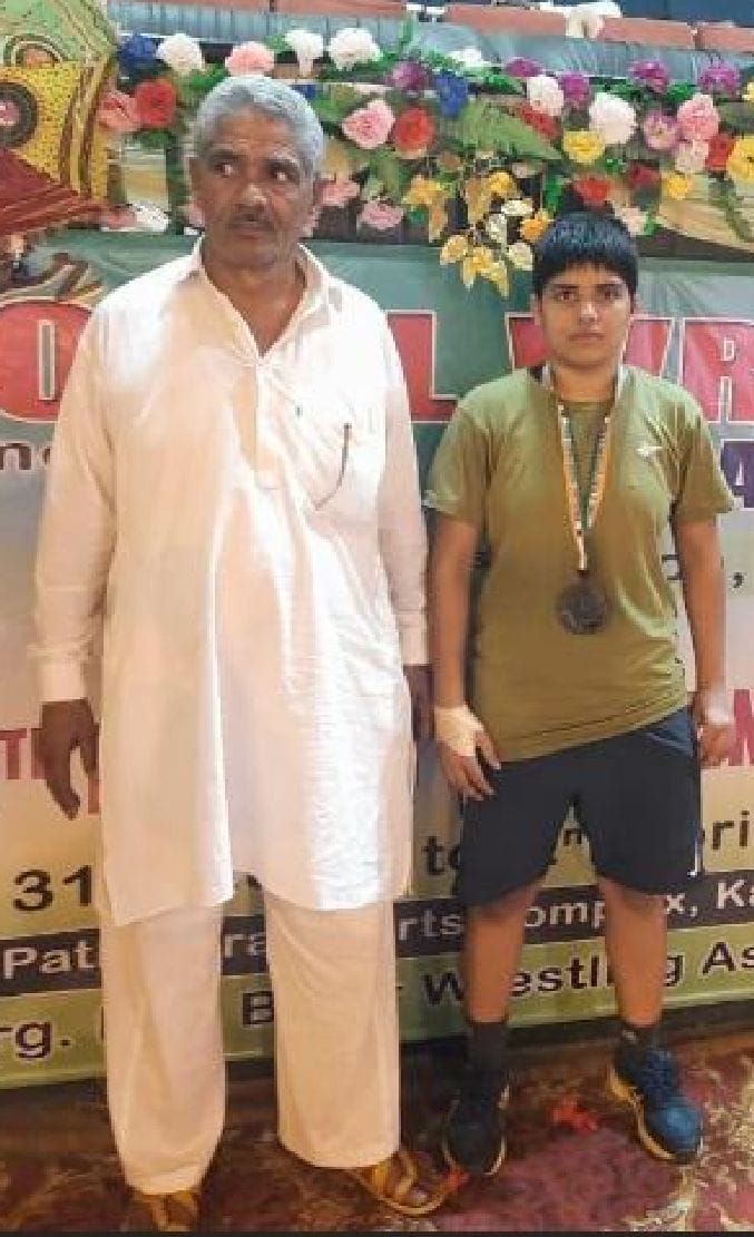 Unfulfilled dreams of wrestler father