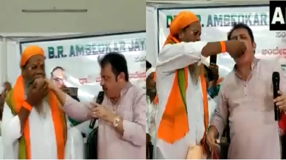 Karnataka Congress MLA Zameer Ahmed Khan Gesture Against Caste Discrimination Ate Food By Taking It Out Of Dalit Swamiji Mouth
