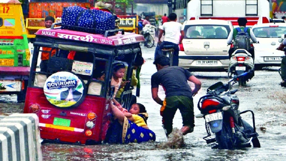 10 injured in different accidents 80 trees fell 100 flights delayed 19 diverted due to rain and strong wind in delhi