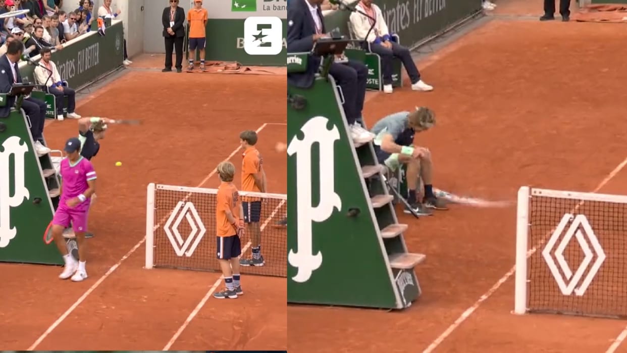Russian tennis Star Andrey Rublev hits ball in anger on floor which hits sweepers face also throw bottel slammed
