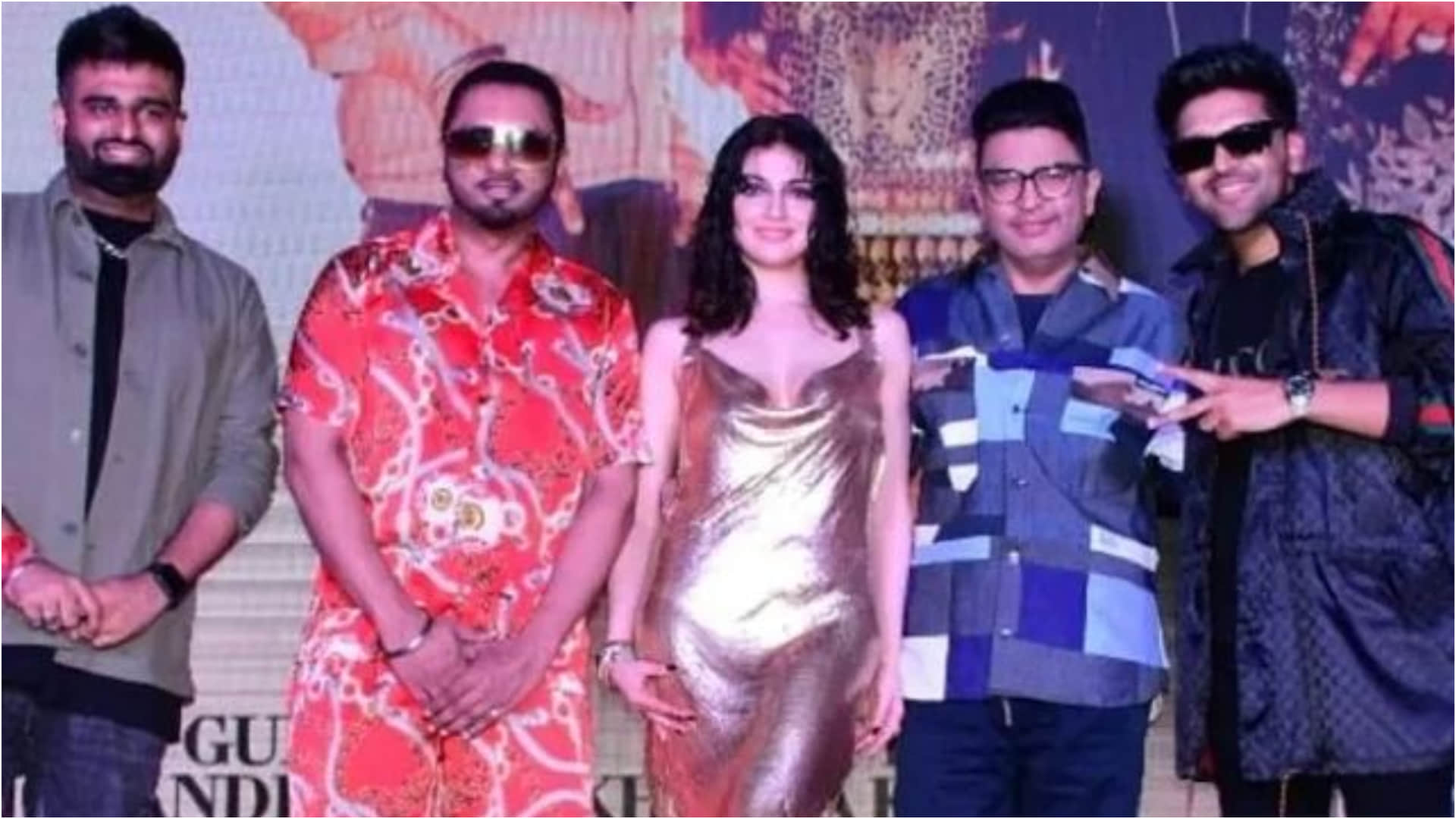 divya khosla kumar bold sultry look in golden dress for song success bash