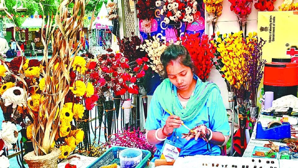 Wooden jewellery and Baghpat Bed sheets attractive in Hunar Haat Agra