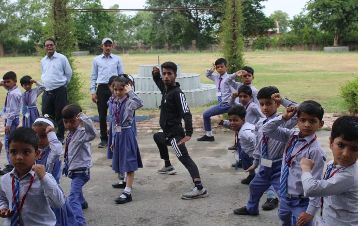 Children learn dance, music and karate tricks