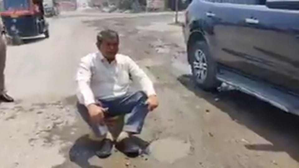 senior congress leader harish rawat stages a sit-in protest at haldwani highway in uttarakhand