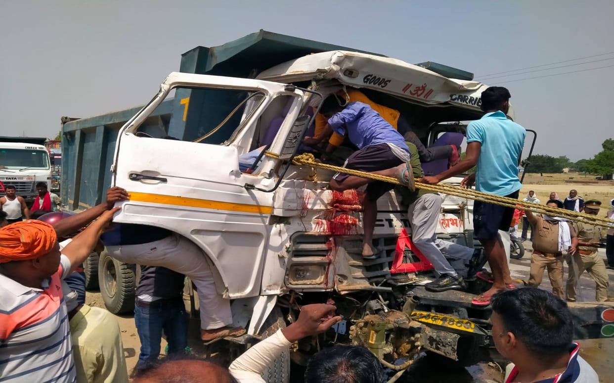 Road Accident in varanasi Dumper collides with truck parked near Ring Road mechanic dies and  driverstuck in  cabin