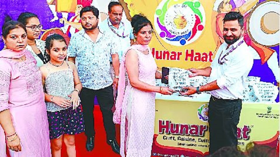 Metal sculptures and embroidery on clothes attracting people know what is special in Hunar Haat
