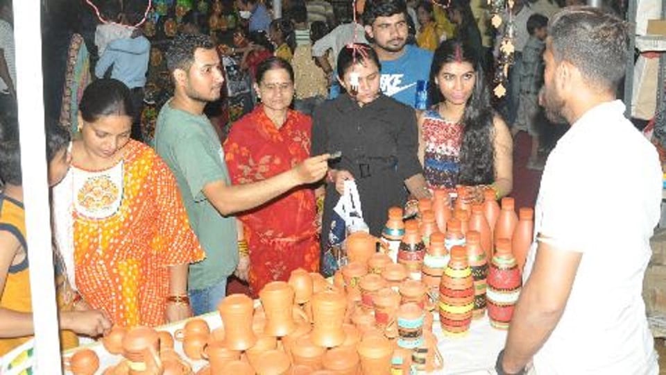 Metal sculptures and embroidery on clothes attracting people know what is special in Hunar Haat