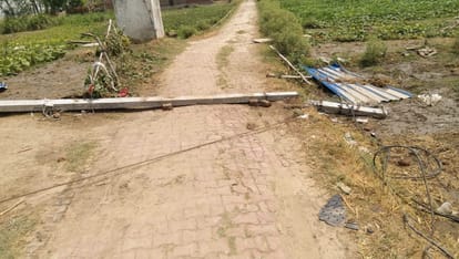 Trees and houses fell in Chitauna village due to strong storm in varanasi , two killed