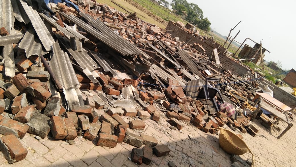 Trees and houses fell in Chitauna village due to strong storm in varanasi , two killed