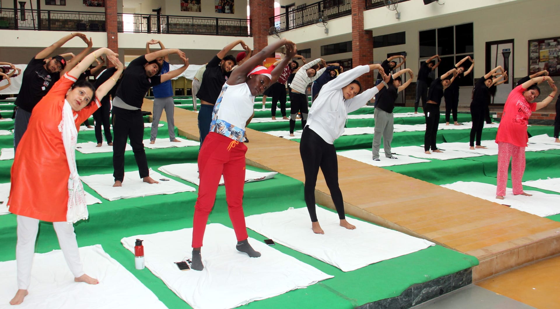 Amar Ujala Yoga Utsav organized in Graphic Era University, students learn how to stay away from exam stress by doing yoga, See Photos