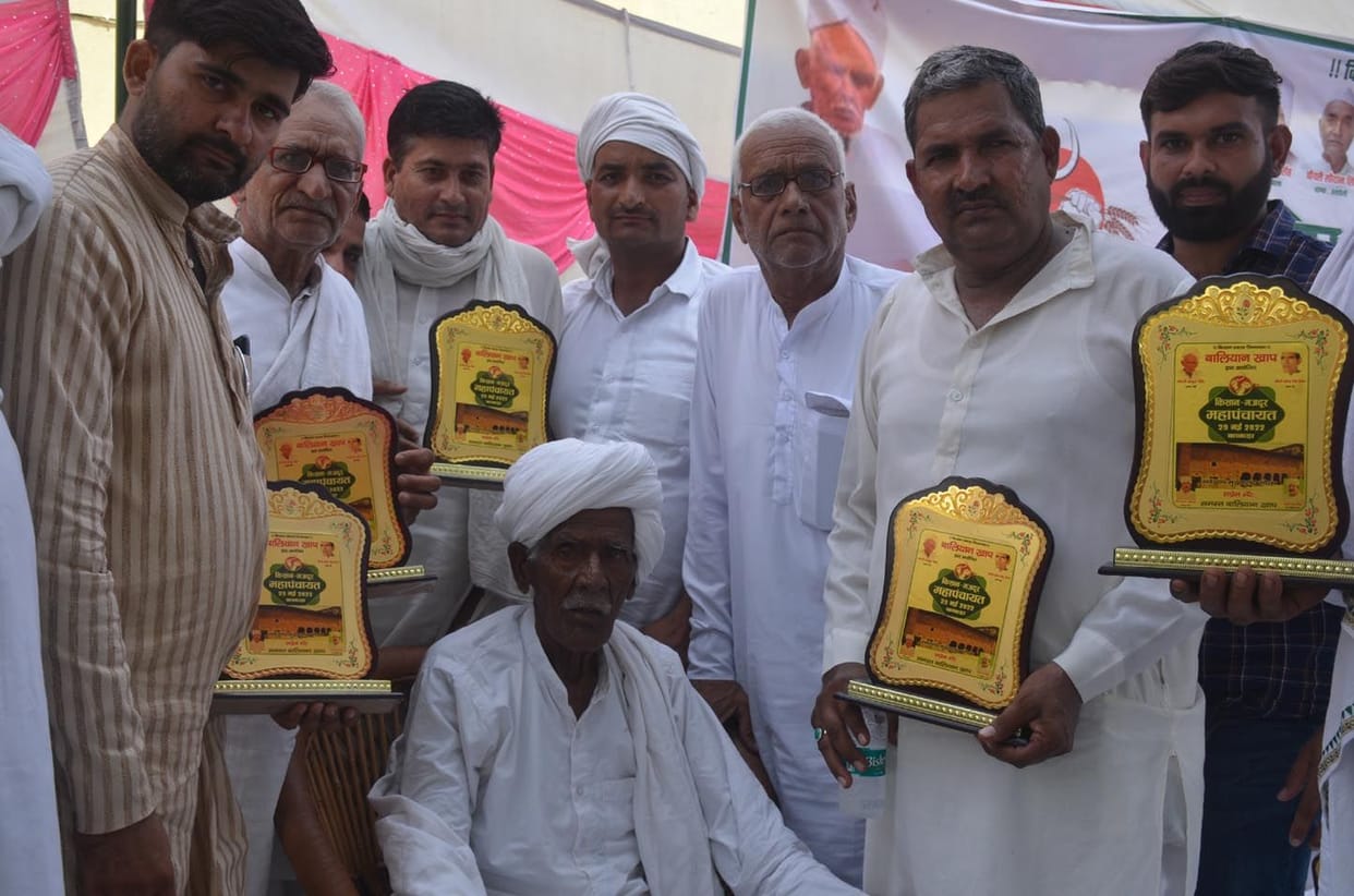 Best Khap title for Gathwala, hand placed on Shyam Singh's shoulder