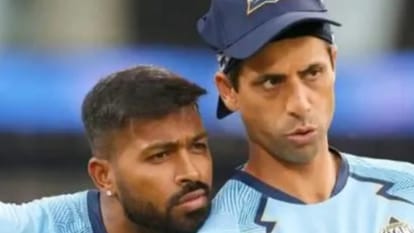 IPL 2022 Ashish Nehra becomes first Indian coach to win IPL nehra was removed by rcb and win tournament with gujarat titans