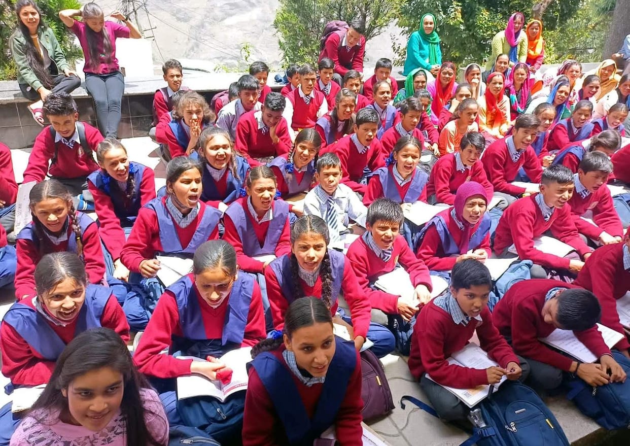 Students and parents sitting on a gradual dharna in Tehsil campus