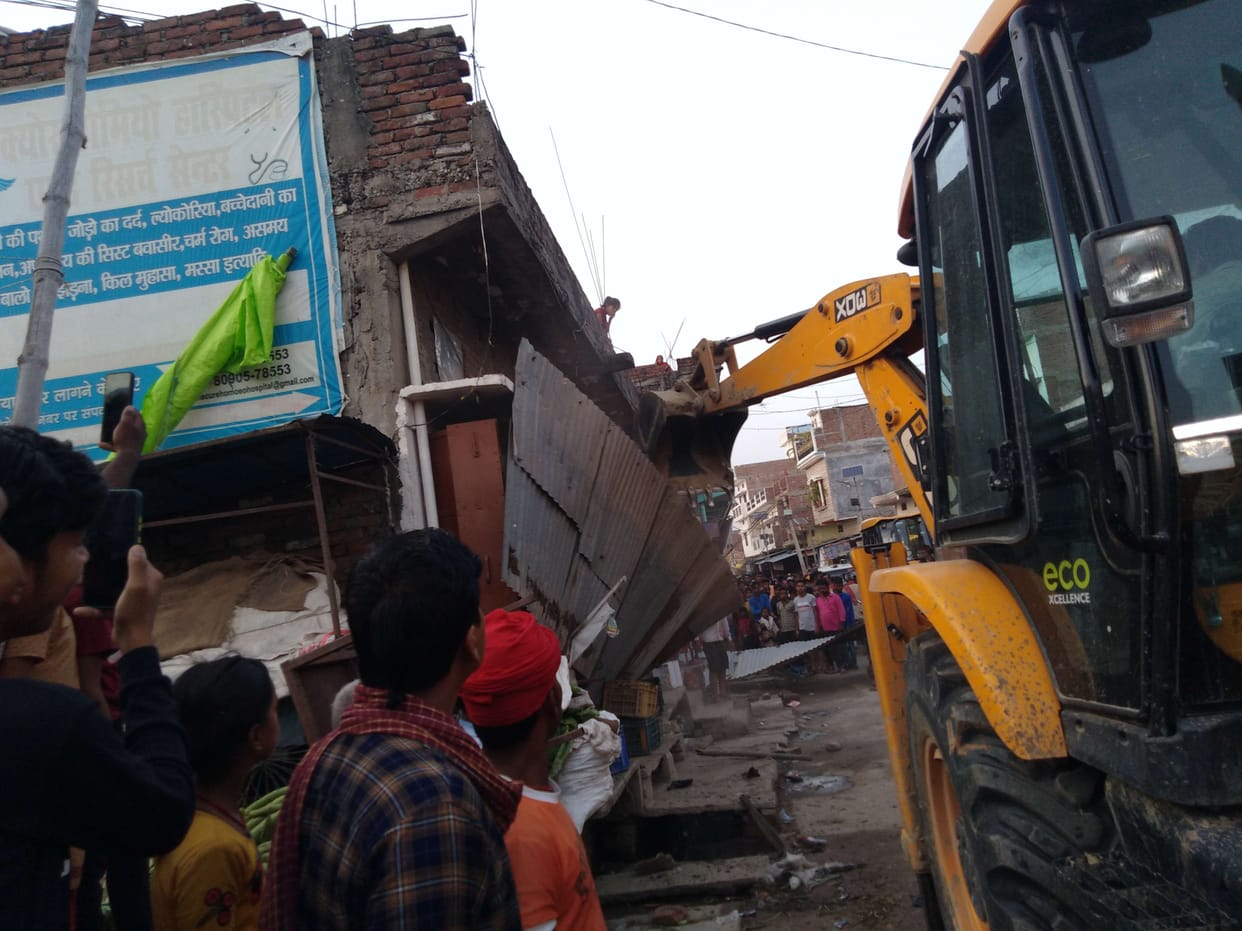 Bulldozers ran across the district, tracks cleared