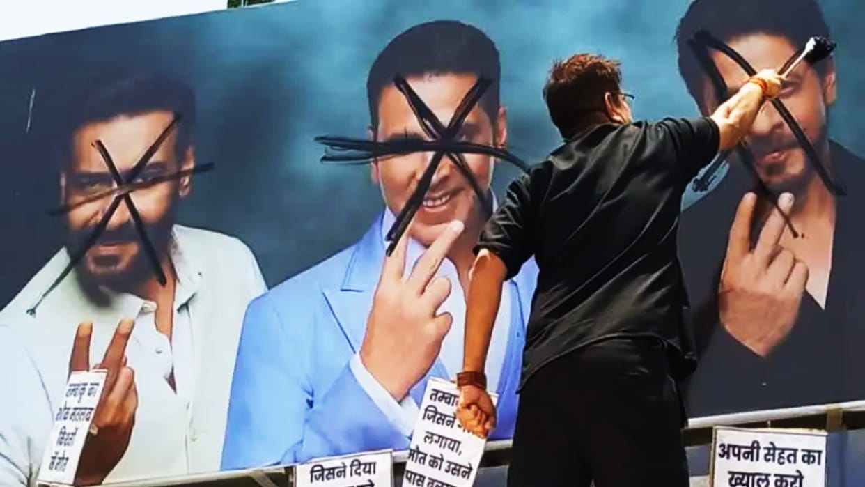 World No Tobacco Day: In Bhopal, posters of Bollywood actors were painted black, protesting against the advertisement of tobacco products.