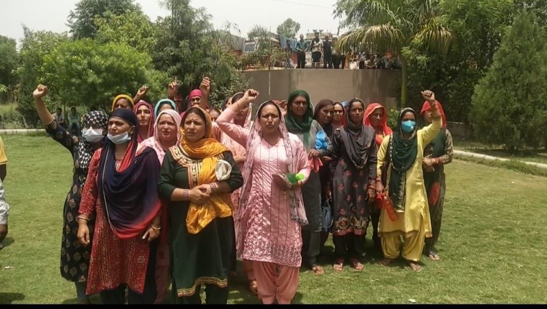 Modi live program inside, demonstration of villagers outside
