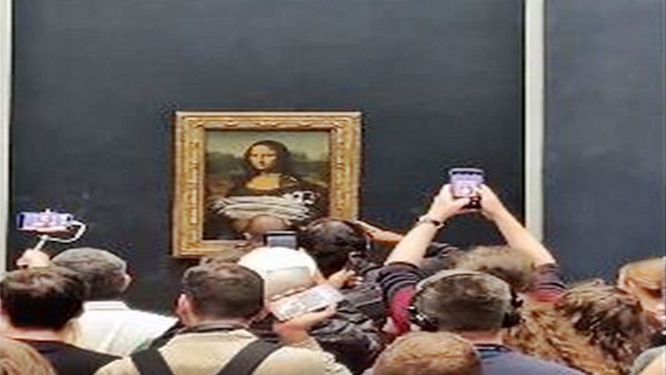 Mona Lisa painting being vandalized at Paris famous Louvre museum